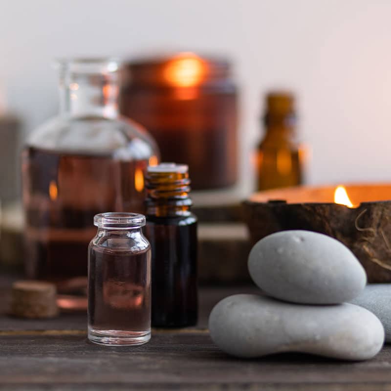 An arrangement of Divine Wellness holistic products and botanicals
