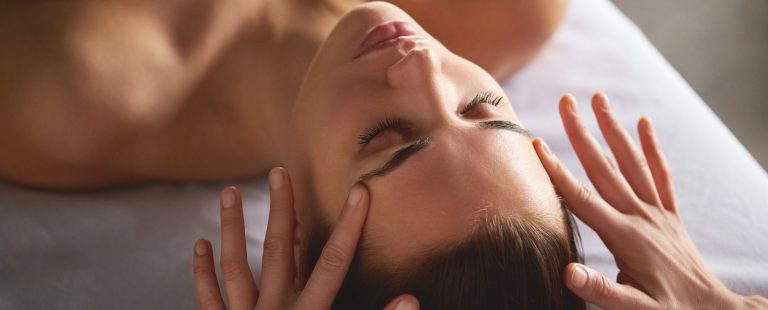 Peppermint scalp treatment — a therapist massaging a client's scalp